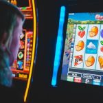 woman playing slot machines in casino